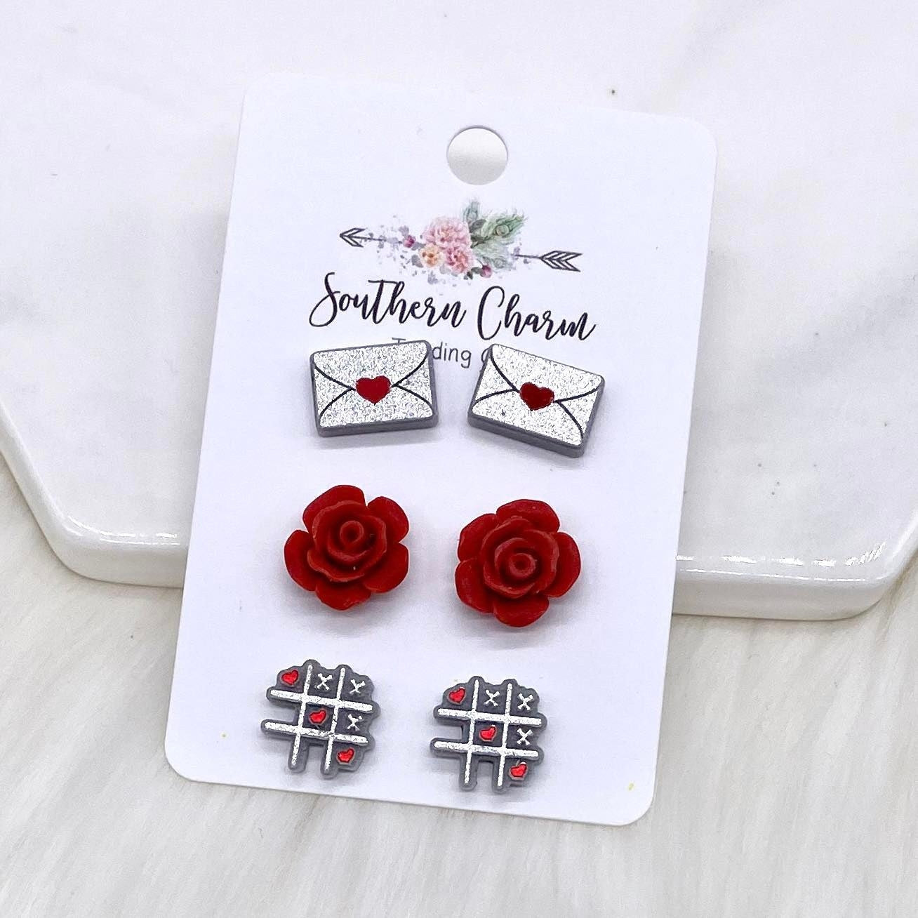 Sealed With A Kiss Trio Studs